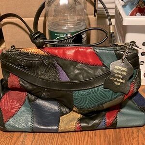 Vintage  leather patch bag.